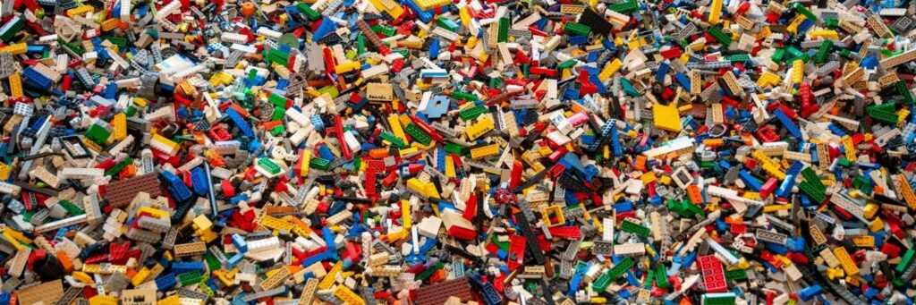 A full image of very small colourful lego pieces.